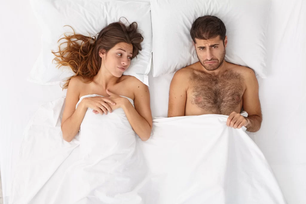 Testosterone Levels By Age Man and woman in bed